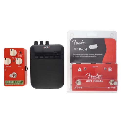 1275 - Elypse Ruby Drop guitar pedal, boxed; together with a Fender ABY pedal and an Aroma AG-03M guitar am... 