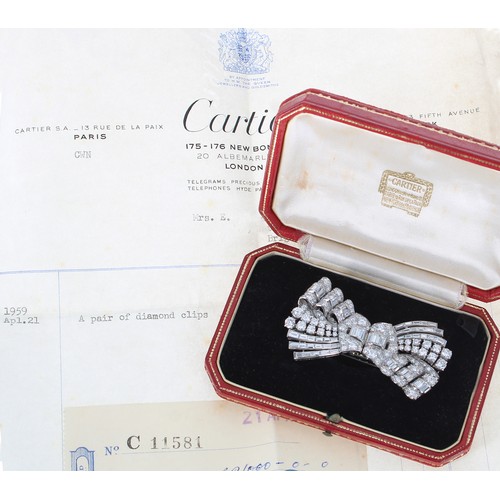 Fine Cartier platinum diamond double-clip brooch, no. 17998, designed as double-clip brooches with clip hinge fittings forming a stylised bow, each set with round brilliant and baguette-cut diamonds, signed, 32.8 gm, 63mm x 34mm