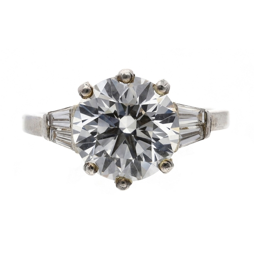 AnchorCert fine platinum solitaire brilliant-cut diamond ring with tapered baguette set shoulders, 2.76ct, clarity VS1, colour F, width 10.5mm, 4.3gm, ring size L (287)