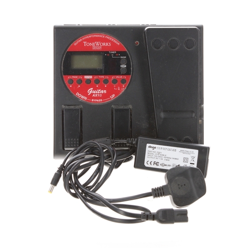 1490 - Korg Toneworks AX1G multi-effects guitar pedal; together with a Diago power supply*Please note: Gard... 