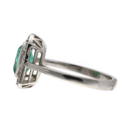 43 - Art Deco style oval emerald and diamond white metal plaque ring, the emerald 1.15ct approx, in a sty... 