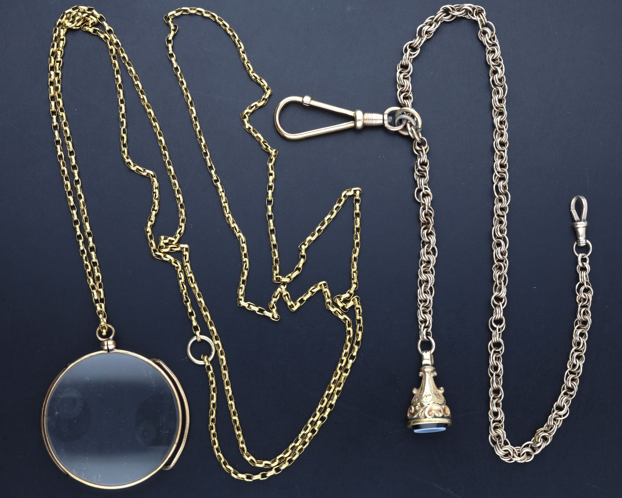 Long Victorian gilded guard chain with an eye glass, 18gm, the chain 40 ...