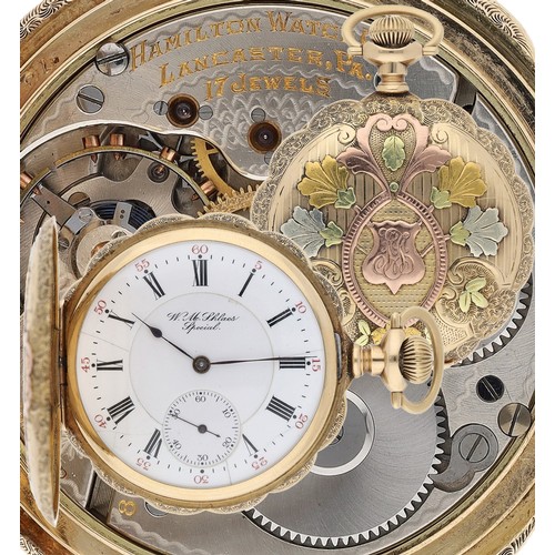 Hamilton Watch Co. 'W.M. Shlaes Special' 14ct lever hunter pocket watch, serial no. 806414, circa 1910, signed 17 jewel adjusted movement with compensated balance and regulator, hinged cuvette inscribed 'Frank Farrel', enamel two part dial inscribed 'W.M. Shlaes Special' with Roman numerals, minute markers with red five minute divisions and subsidiary seconds, within an ornate triple colour gold case with monogram, no. 6417299, case maker 'J.K', 108.2gm, 51mm