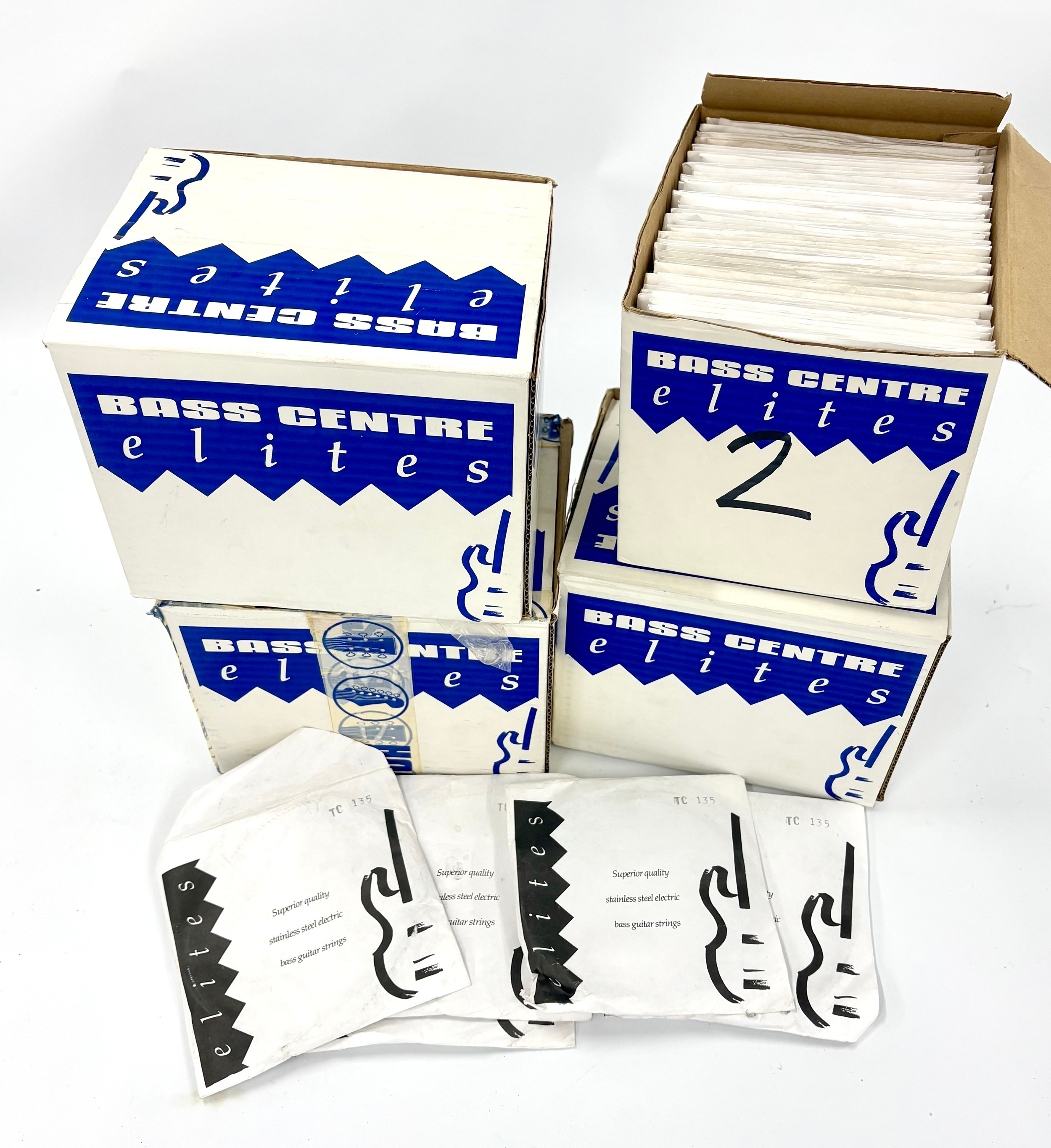 Four boxes of Bass Centre Elites bass strings singles ranging in gauge ...