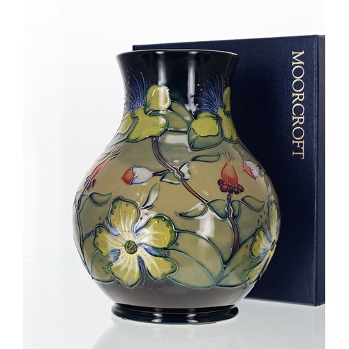 656 - Moorcroft Pottery - 'Hypericum' pattern vase, bearing a factory stamp and artist marks, with the gat... 