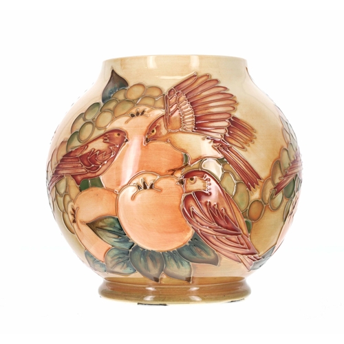 657 - Moorcroft Pottery - an ochre 'Finch' pattern vase, bearing a factory stamp and the arrow date mark f... 