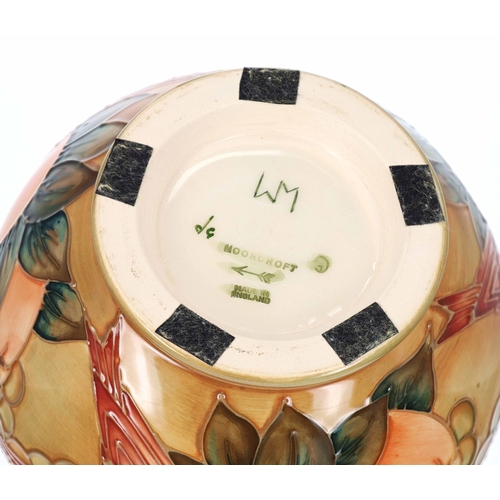 657 - Moorcroft Pottery - an ochre 'Finch' pattern vase, bearing a factory stamp and the arrow date mark f... 