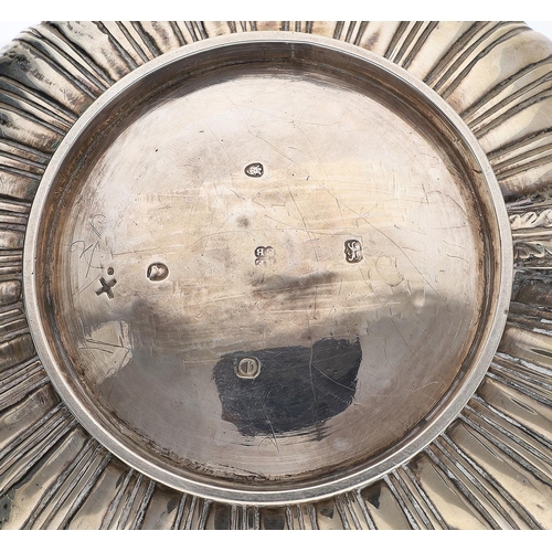 425 - George IV silver teapot, of squat circular shape, the central band of flowers framed by gadrooning, ... 