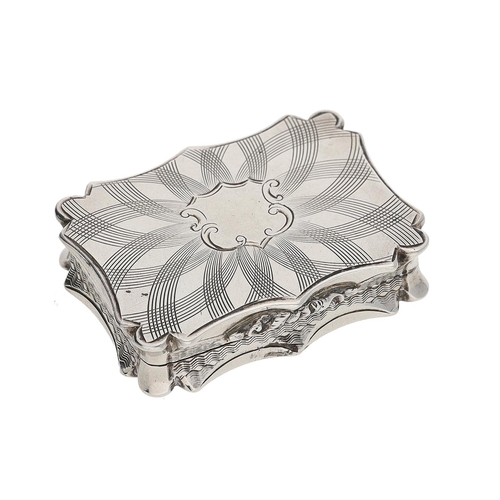 484 - Victorian silver vinaigrette, of shaped rectangular outline with engraved decoration around a centra... 
