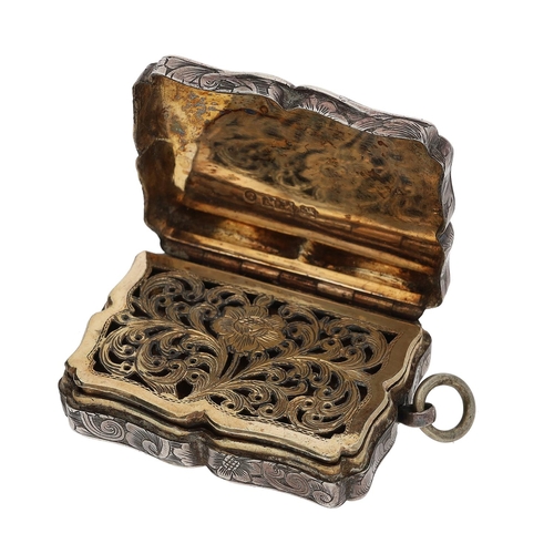 485 - Victorian silver vinaigrette, of shaped rectangular form with engraved decoration, gilt interior, su... 