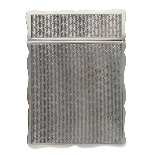 494 - PJD Silver Ltd silver card case, having a shaped edge and engine turned decoration to the front and ... 