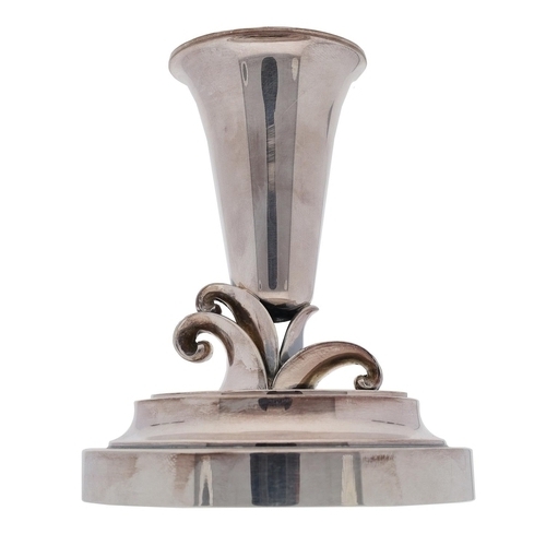535 - Modern Danish silver candlestick, the support raised on stylised leaf scrolls and a circular stepped... 