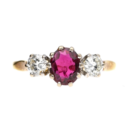 Attractive 18ct yellow gold ruby and diamond three stone ring, the ruby ...