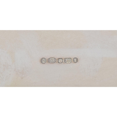 417 - Good modern Francis Howard Ltd silver salver, having a cast moulded edge and raised on three feet, 1... 