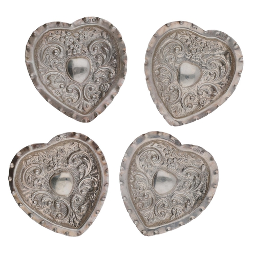 470 - Group of four late Victorian heart shaped small silver dishes, with ornate decoration, Birmingham 18... 