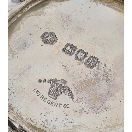 567 - Pair of Edward VII silver salts, having heavy cast fruit rim and raised on three stylised feet, make... 