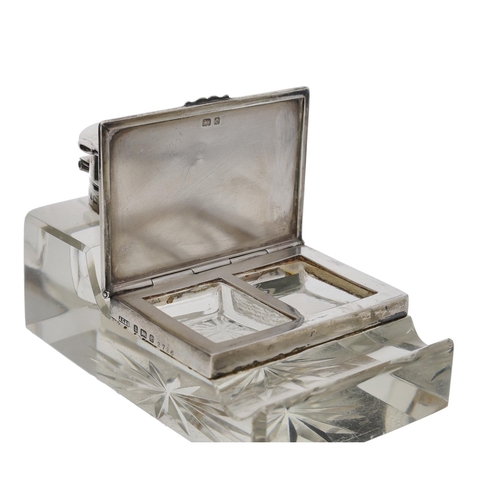 569 - Edward VII silver mounted glass desk stand, the ink well with inset watch, over a stamp bos with two... 