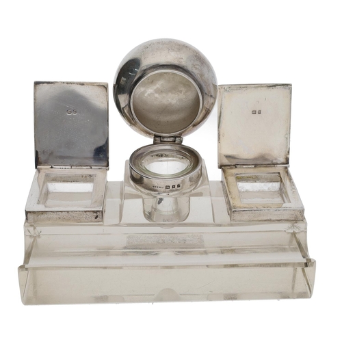 570 - George V silver mounted glass desk stand, having a central ink well flanked stamp boxes, by maker AM... 