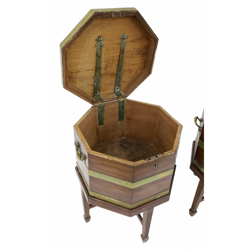 831 - Fine pair of George III octagonal mahogany wine coolers (caisse à vin) on stands, 22