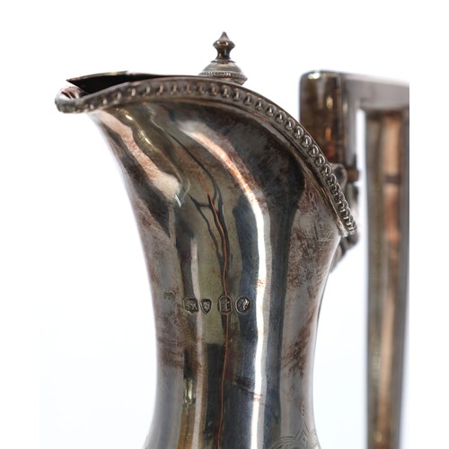 560 - Victorian silver claret jug with hinged cover, the body with fine chased borders and motif, maker Ma... 
