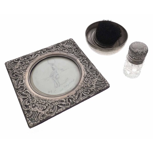 464 - Edwardian silver photograph frame, with ornate decoration, Birmingham 1903; together with a table br... 
