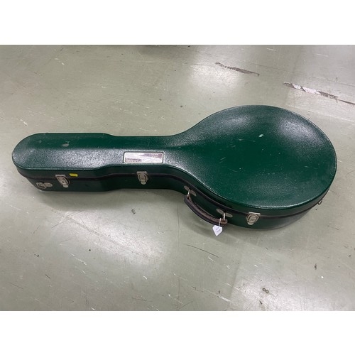 2526 - W.G. Coker & Son four string banjo, with satinwood and ebony banded inlaid concave resonator, mo... 