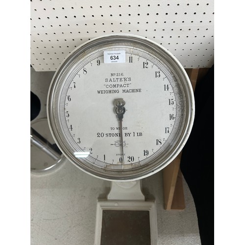 634 - Salters 'Compact' white painted metal weighing machine, number 216, with a circular dial... 