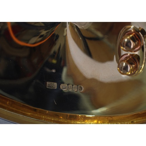 63 - Good Hamilton & Inches modernist sterling silver two branch candelabra, having two cone sconces ... 