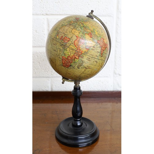 101 - Geographia 6 inch terrestial globe, with ebonised baluster stem and circular base, 13