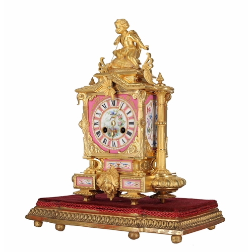 1223 - Attractive 19th century French porcelain and ormolu mantel clock, the brass drum two train movement ... 