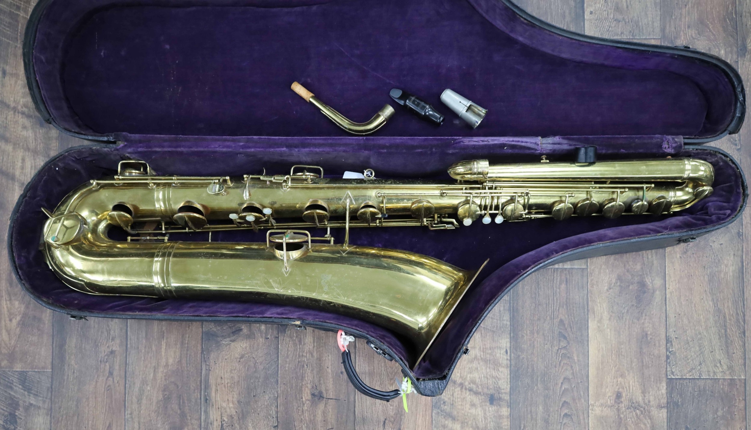 Conn bass saxophone inscribed made by C.G Conn, Ltd. Elkhart, Ind, 1921 ...