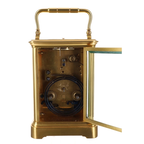 1011 - Good French striking and repeating gilt brass carriage clock by Henri Jacot, the white dial with Rom... 