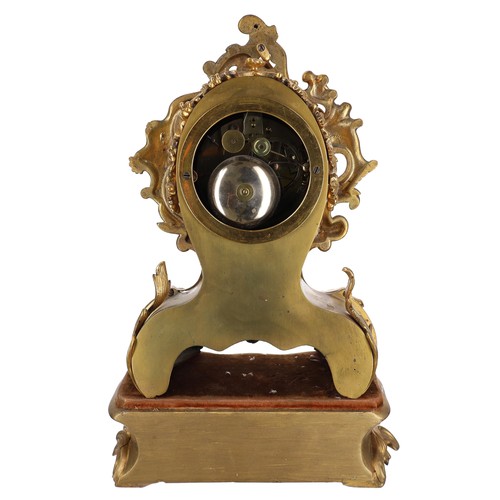 1212 - French two train ormolu mantel clock upon a shaped giltwood stand, the 2.7