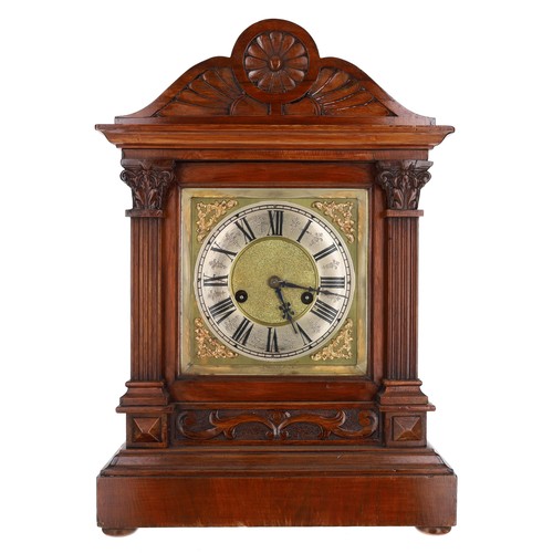 1199 - Late 19th century carved walnut mantel clock, the 5.75