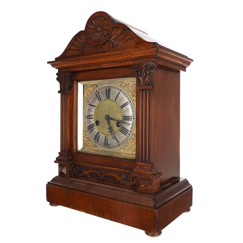 1199 - Late 19th century carved walnut mantel clock, the 5.75