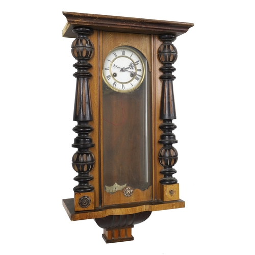 1253 - Vienna walnut and ebonised two train wall clock (no pendulum); with an oak cased two train wall cloc... 
