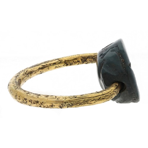 74 - Interesting scarab intaglio yellow metal swivel ring, 5gm