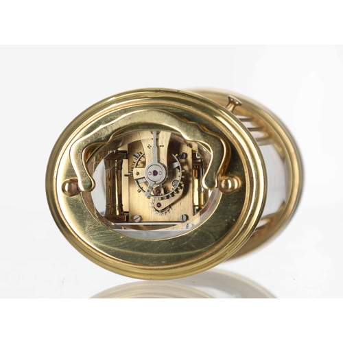 1034 - French miniature oval carriage clock timepiece, the enamel dial with Roman numerals, platform lever ... 