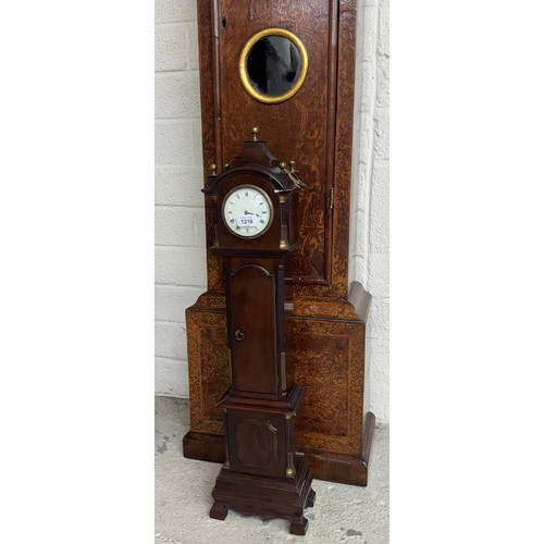 1218 - Charming miniature mahogany longcase clock and wall bracket in the George III manner, the case with ... 