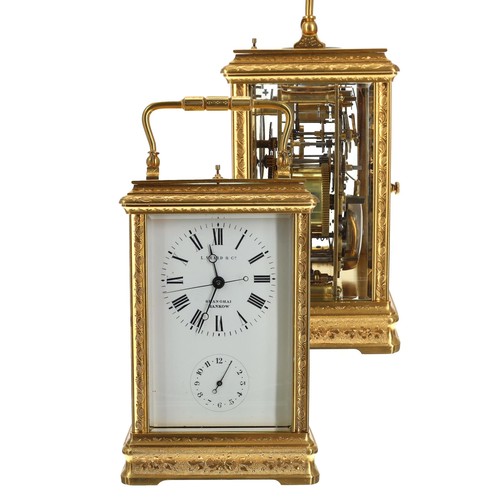 Fine French repeating alarm carriage clock made for the Chinese market, attributed to Charles Joseph, Paris  and retailed by L. Vrard & Co., Shanghai, circa 1890, the dial with centre seconds, Roman numerals, outer minute markers , Breguet type blued steel hands over the subsidiary alarm dial, eight-day movement with a silvered platform lever escapement, striking the the half hour and hours on a bell, numbered 689 tot he lower back plate with opposing Chinese characters, within a fine foliate engraved cannelee gilt-brass bevelled glazed case with a push repeat button striking the hours, 8" high with the handle raised, 6.5" handle down