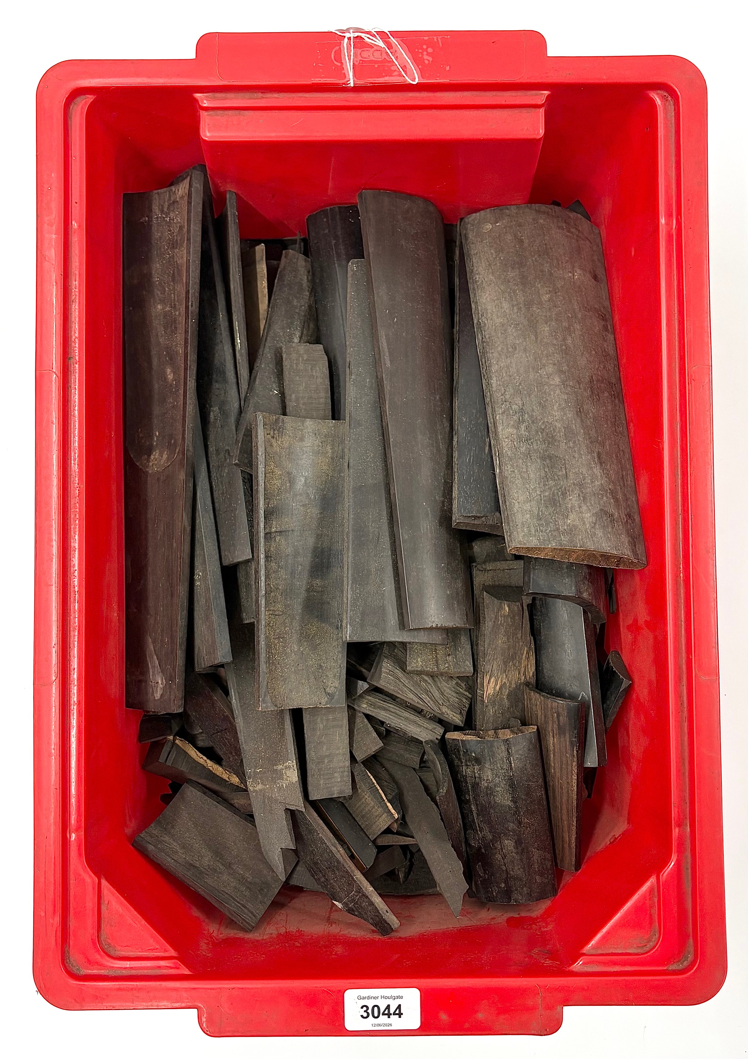 Tub of ebony chunks, useful for topknots, saddles, frogs and repairs etc