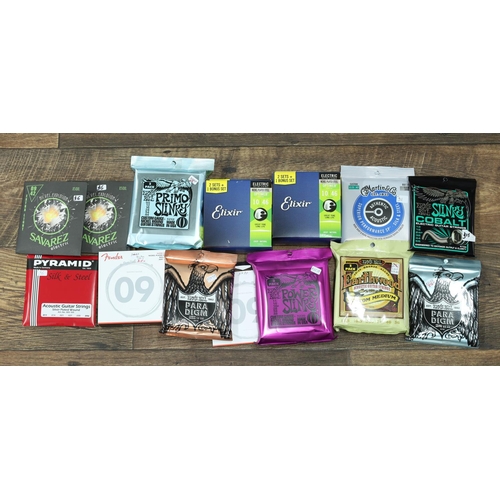 Good selection of guitar string sets including three boxed packs ...