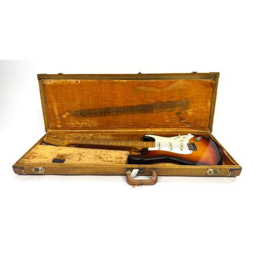 6 - 1959 Fender Stratocaster electric guitar, made in USA; Body: three-tone sunburst finished alder, som... 