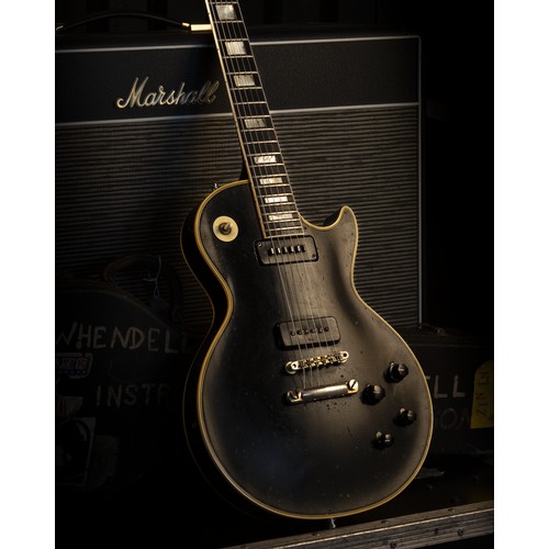 Wendell Richardson (Osibisa & Free) B.B King & Muddy Waters interest - Stage and Studio used 1956 Gibson Les Paul Custom electric guitar, made in USA, ser. no. 6 9251; Body: black finish, heavy checking, dings and marks throughout including buckle scratching to back; Neck: black finish mahogany, heavy wear throughout, vacant tuner holes to back of head; Fretboard: ebony with pearl block position markers, light wear; Frets: light wear; Electrics: working; Hardware: missing pickguard, replacement control knobs, replacement switch tip and surround, sinking to bridge, replacement Schaller tuners, replacement strap lock buttons; Case: Original hardcase; Weight: 4.78kg; Overall condition: good