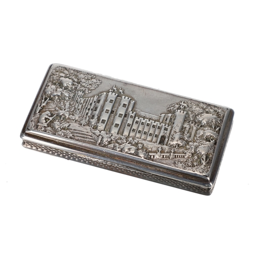 William IV silver castle top snuffbox, the rectangular hinged lid worked in relief with a view of Kenilworth Castle, gilt interior with engine turned decoration to the underside, maker Nathaniel Mills, Birmingham 1837, 2.75" long, 56.9gm