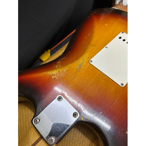 6 - 1959 Fender Stratocaster electric guitar, made in USA; Body: three-tone sunburst finished alder, som... 