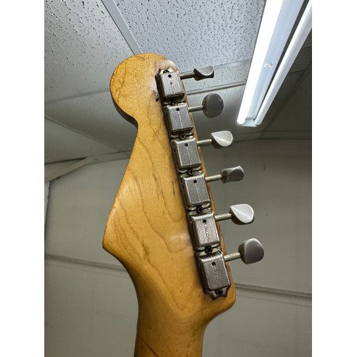 6 - 1959 Fender Stratocaster electric guitar, made in USA; Body: three-tone sunburst finished alder, som... 
