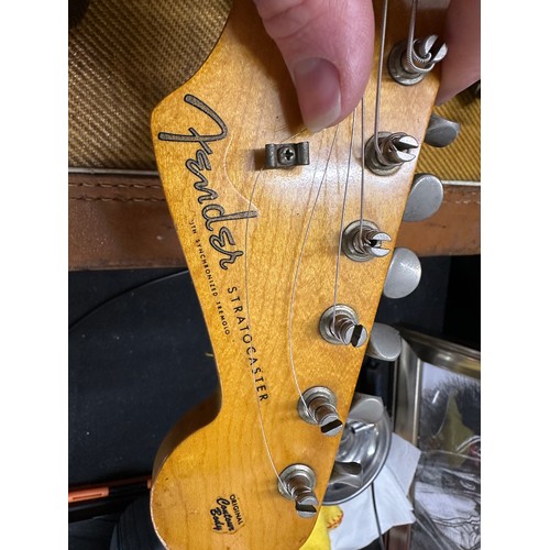 6 - 1959 Fender Stratocaster electric guitar, made in USA; Body: three-tone sunburst finished alder, som... 
