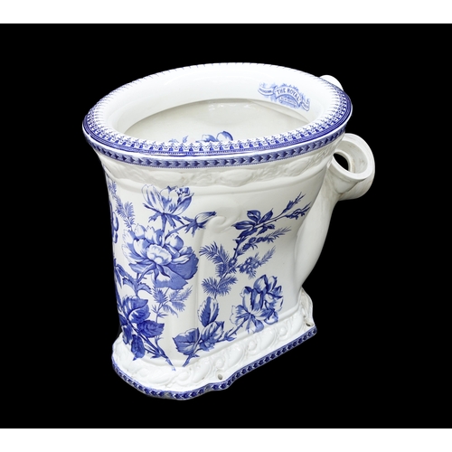 Antique washdown pedestal toilet "The Royal", registered number 304739, with blue and white floral transfer printed decoration, 16" high, 18" maximum depth