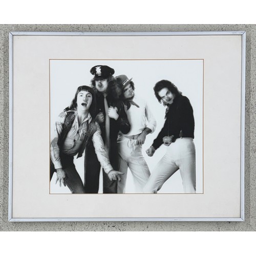 31 - Gered Mankowitz (born 1946) - Slade 'Red Noses', 1976, printed 1981, bromide print, framed 16.25 x 2... 